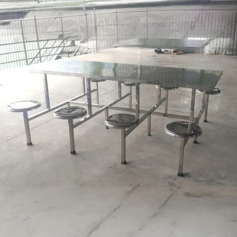Bàn ăn công nghiệp inox 8 chỗ - Inox Bách Khoa Bàn ăn công nghiệp inox 8 chỗ làm từ inox 304, mặt bàn dày 1mm, khung hộp 40x40 chắc chắn